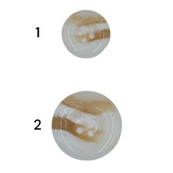 Κουμπί μόδας με μπεζ λεπτομέρειες Κουμπί μόδας με μπεζ λεπτομέρειες